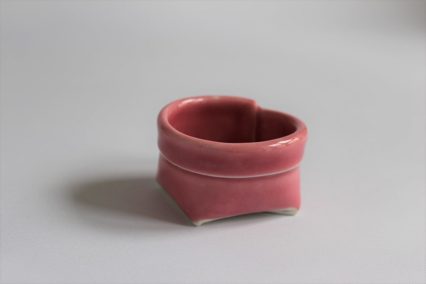 1. Lyserød porcelænspose
