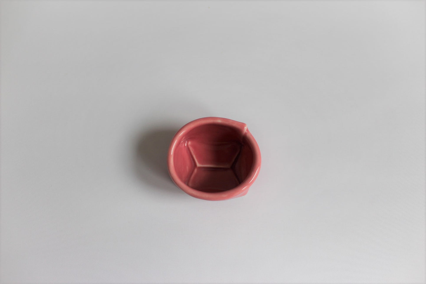 1. Lyserød porcelænspose