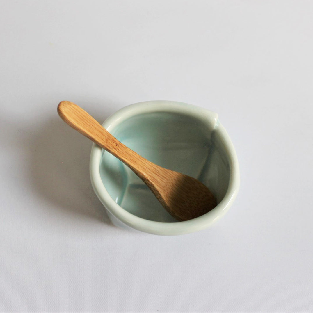 1. Turkis porcelænspose