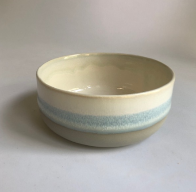 Small bowl with matte grey base and ice-blue glaze