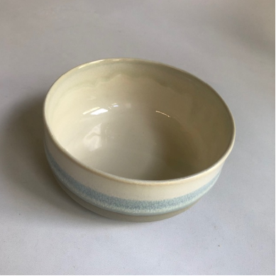 Small bowl with matte grey base and ice-blue glaze