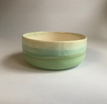 Small bowl with matte green base and green glaze