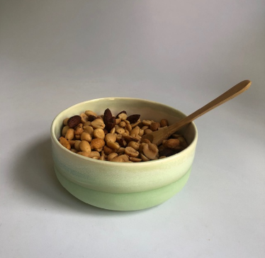 Small bowl with matte green base and green glaze