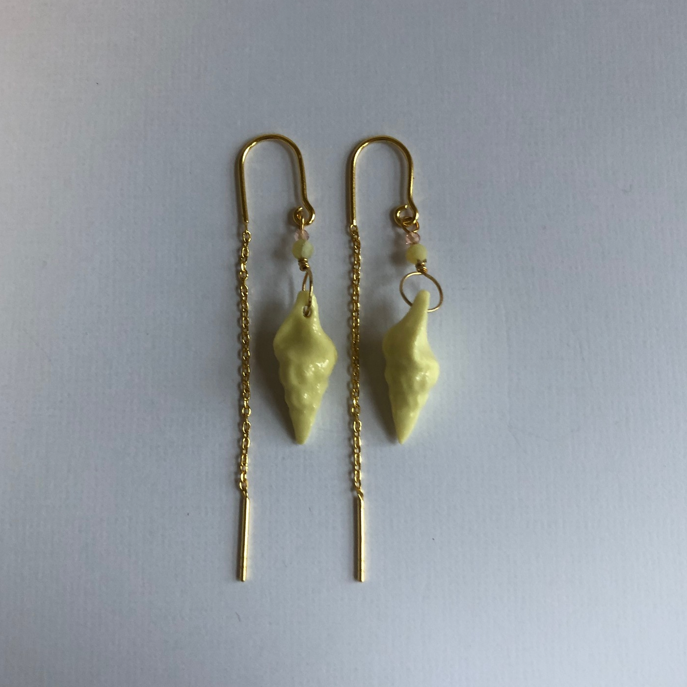 Earrings with handmade porcelain conch shells and stone beads