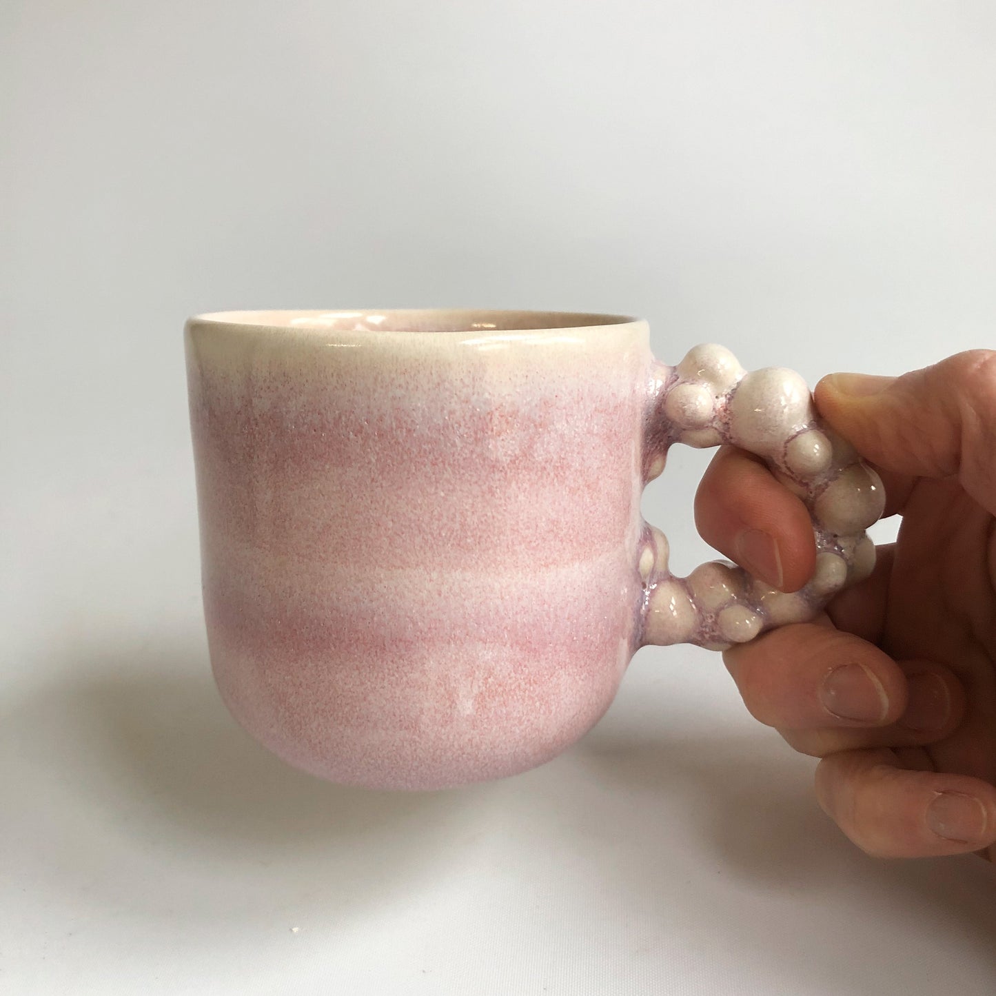 Little cup with rosa glaze