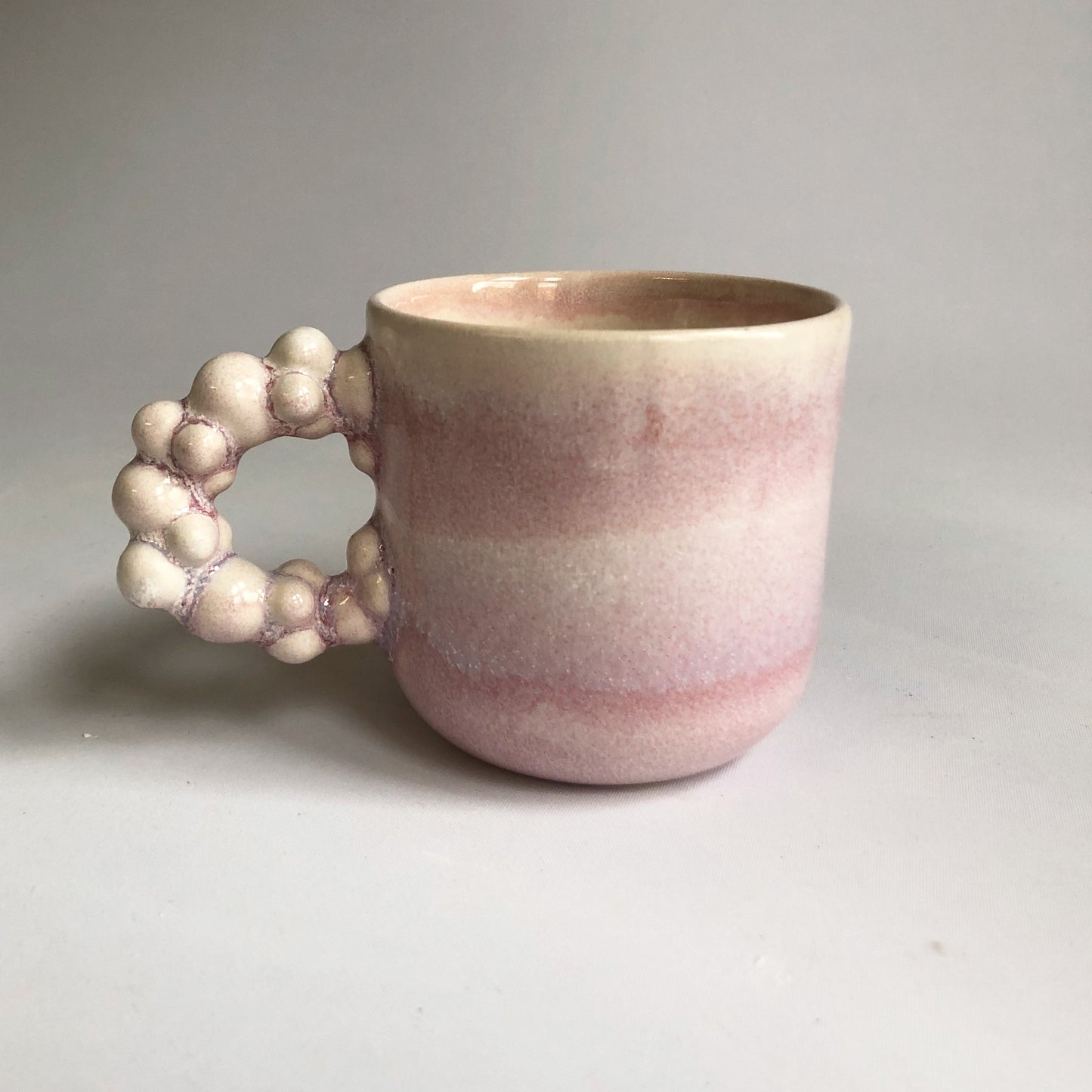 Little cup with rosa glaze