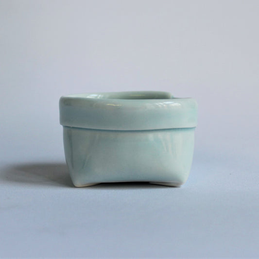 1. Turquoise Porcelain Bag