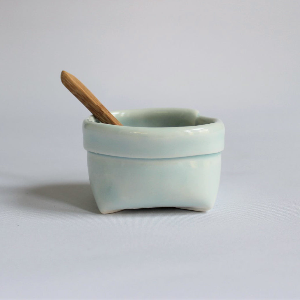 1. Turquoise Porcelain Bag