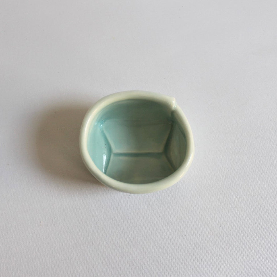 1. Turquoise Porcelain Bag