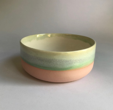 Small bowl with a matte pink bottom and green glaze