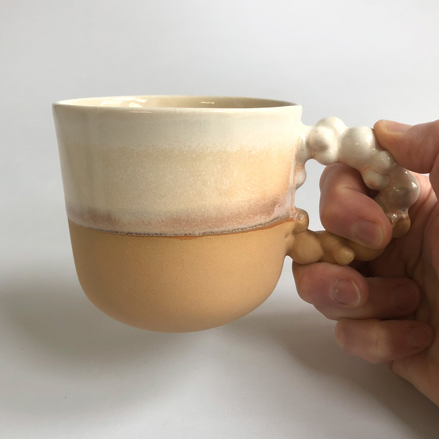 Big cup with matte light brown and white glaze