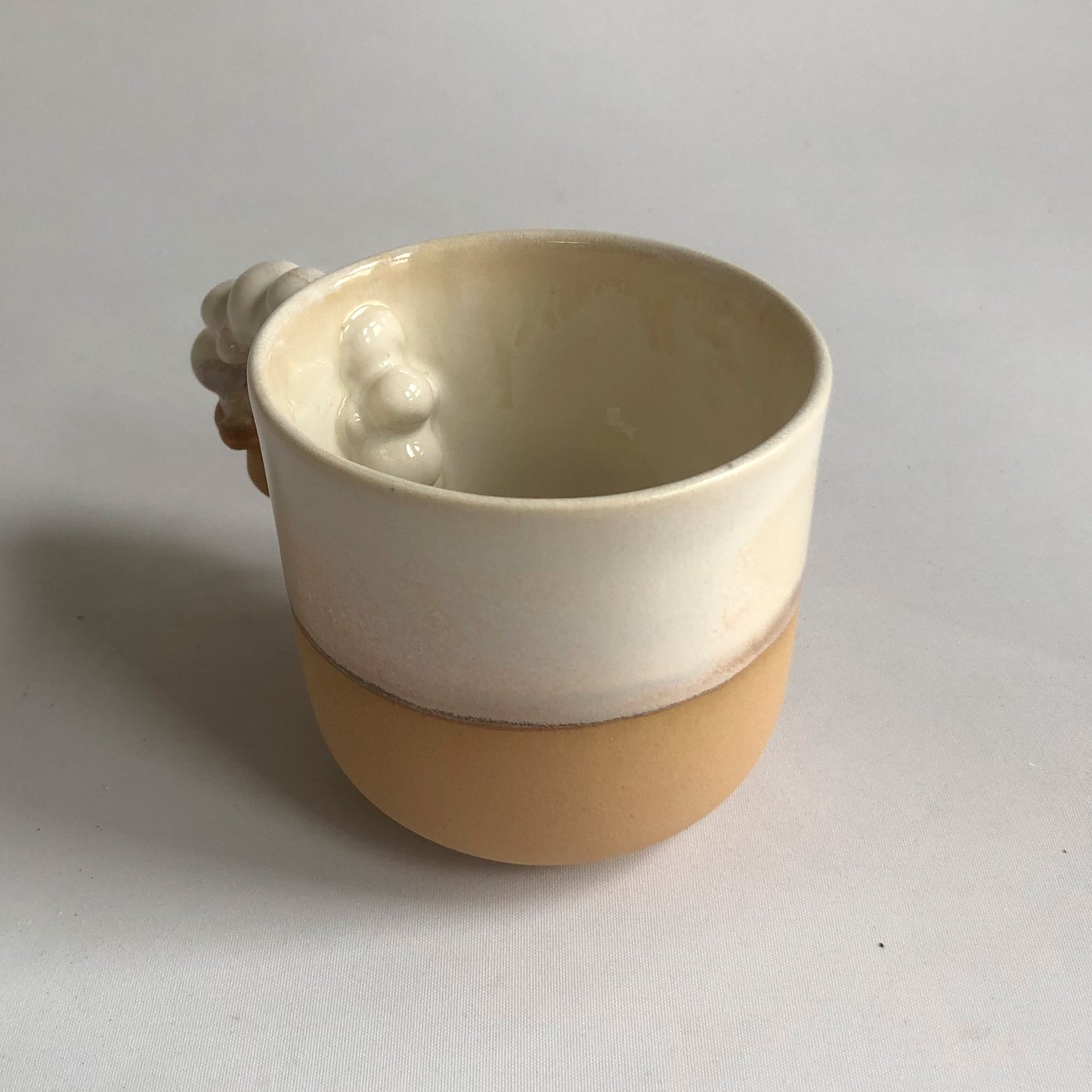 Big cup with matte light brown and white glaze
